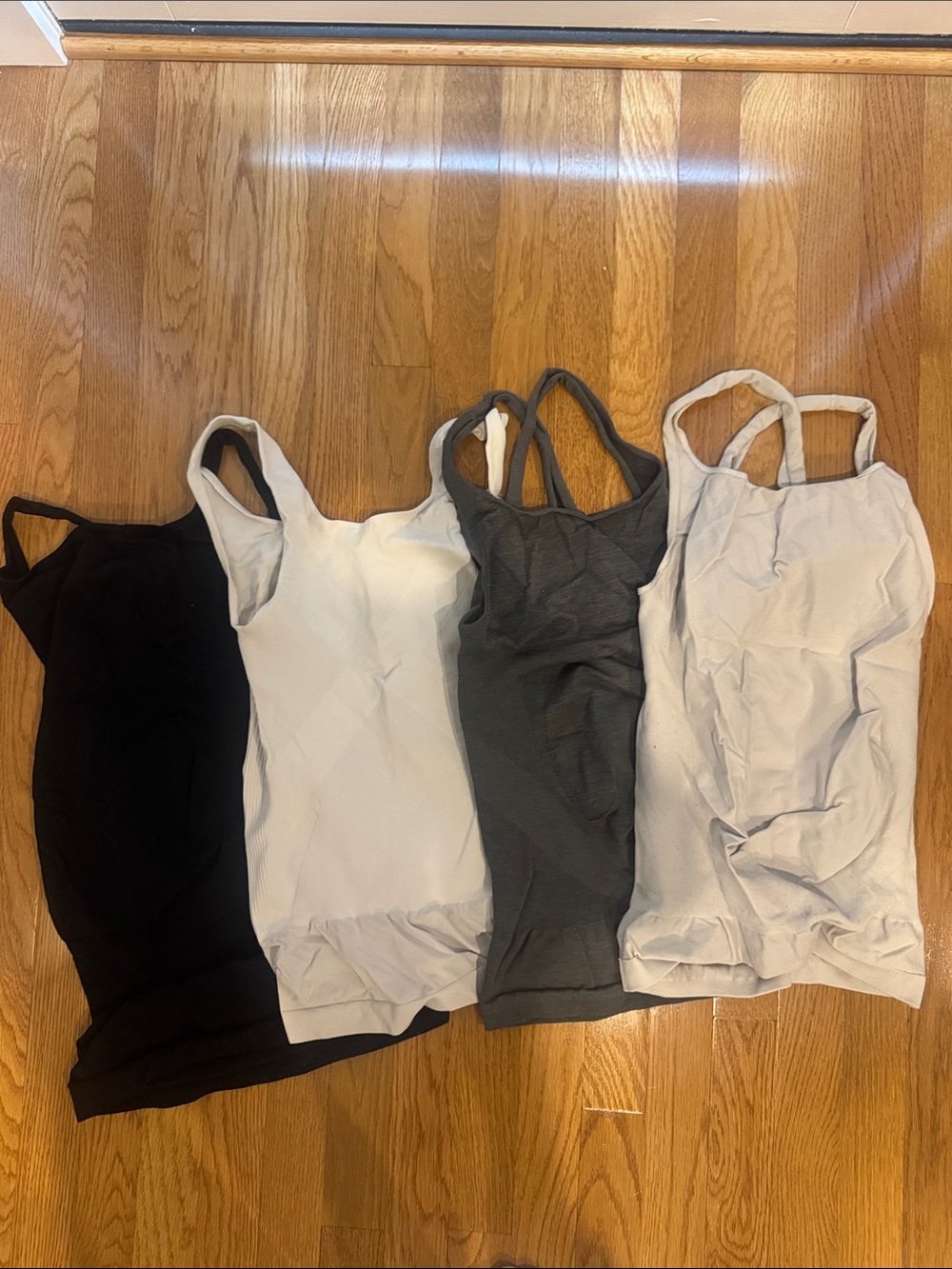 BLANQI Four-Pack Scoop Tank Tops in Black, White, Gray, Cream